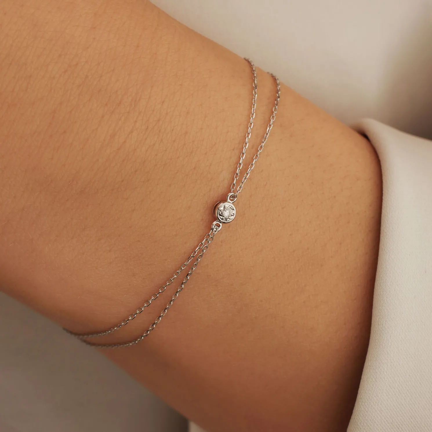 De la Paix Inaya 14 karaat witgouden armband met diamant 0.02 karaat