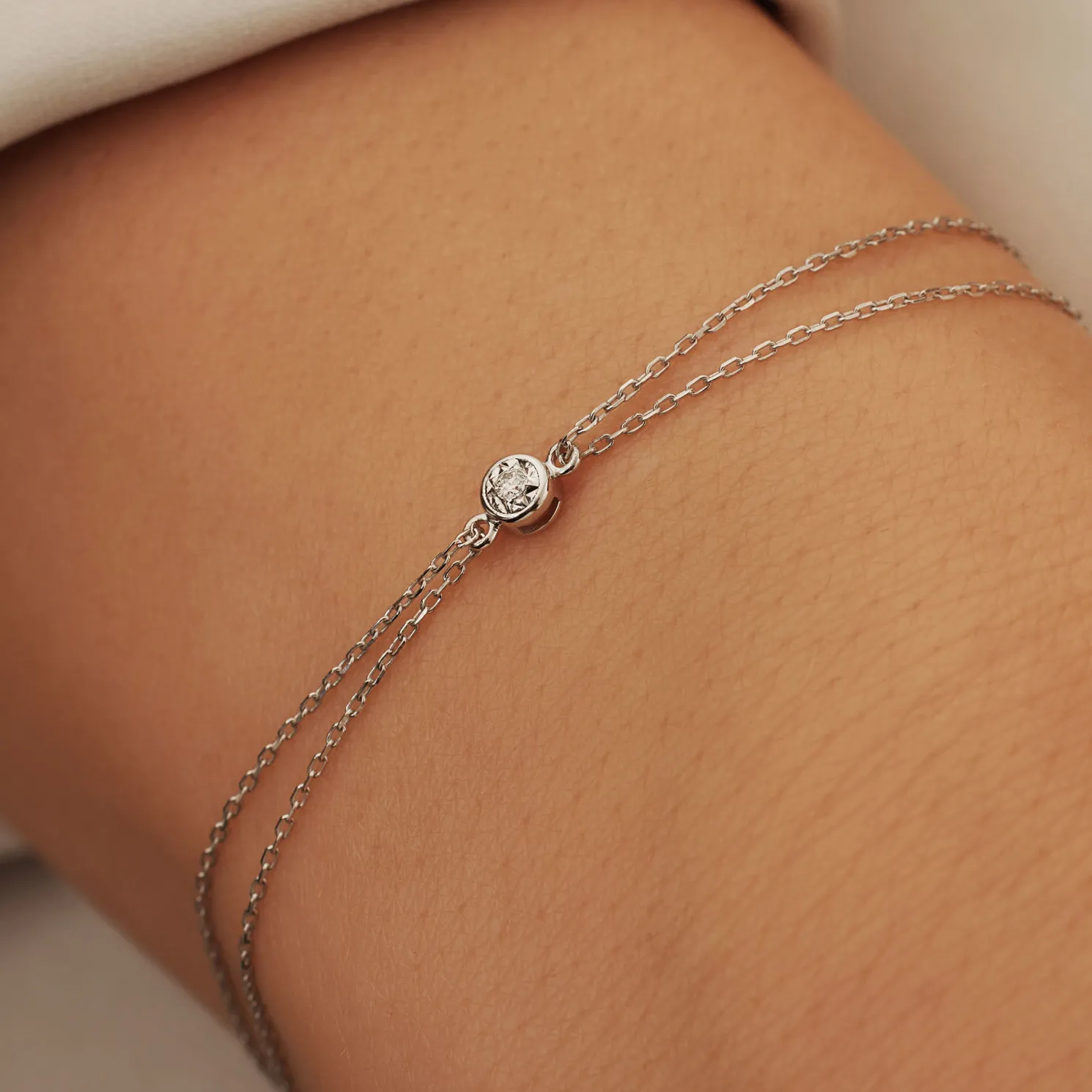 De la Paix Inaya 14 karaat witgouden armband met diamant 0.02 karaat