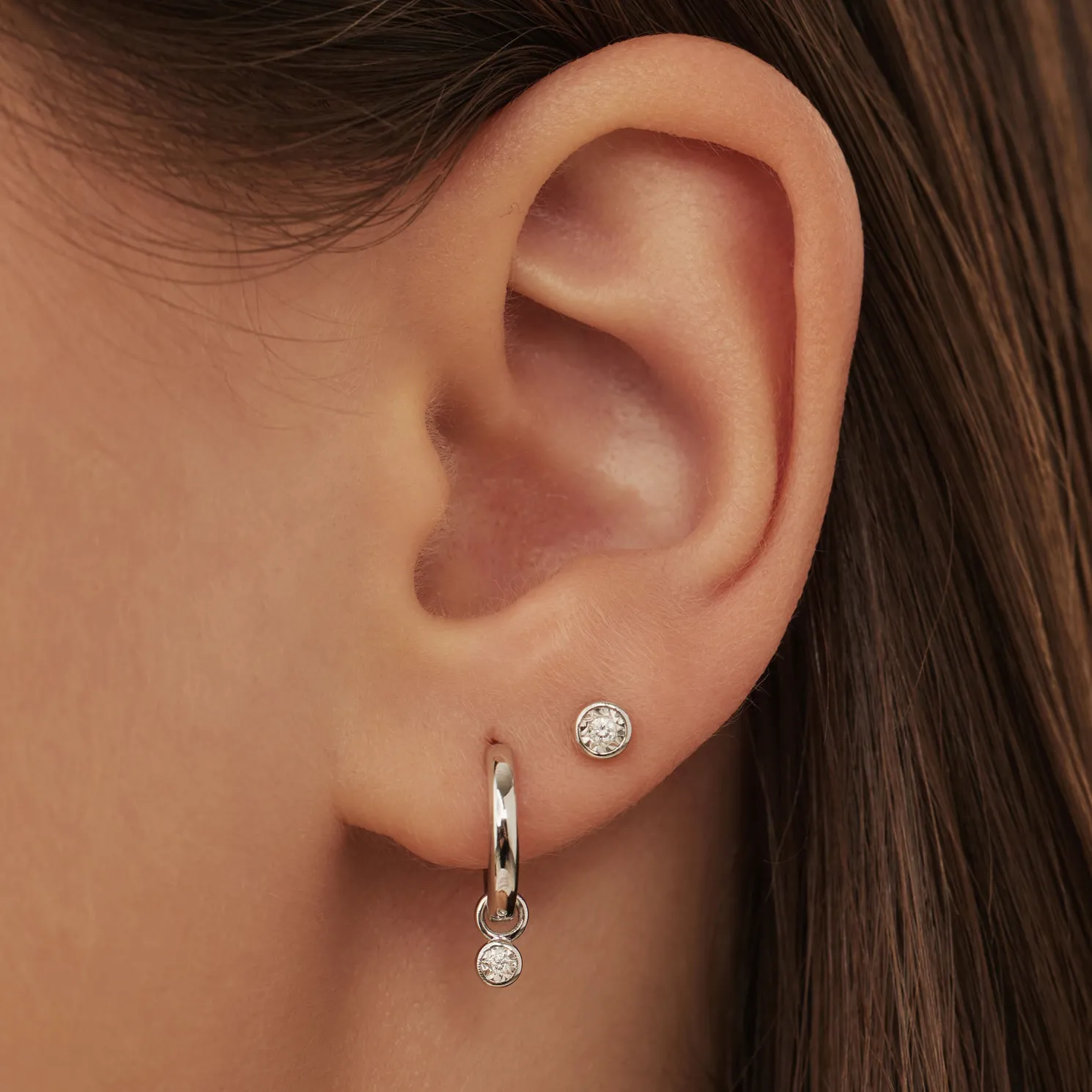 De la Paix Inaya 14 karaat witgouden creolen met diamant 0.02 karaat