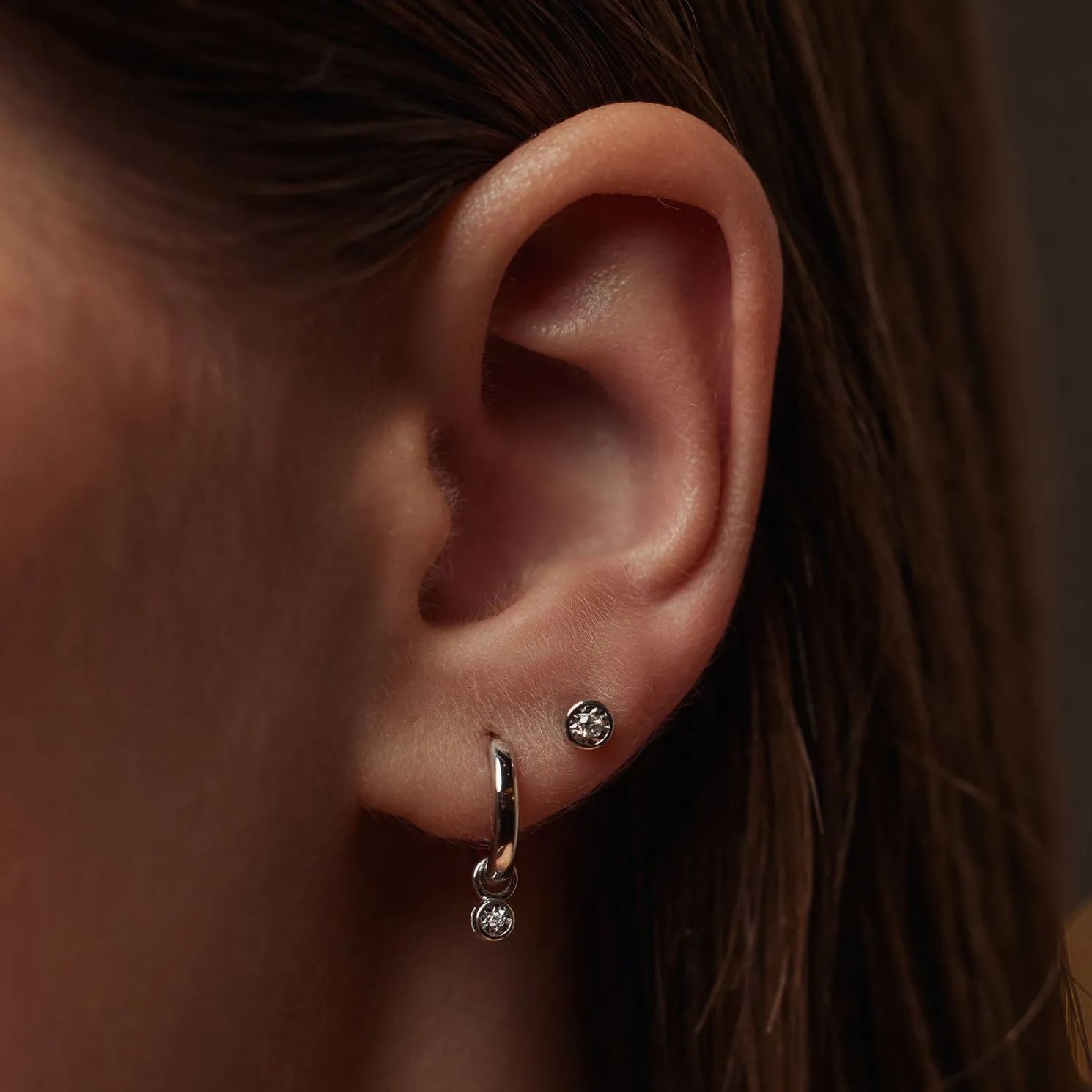 De la Paix Inaya 14 karaat witgouden creolen met diamant 0.02 karaat