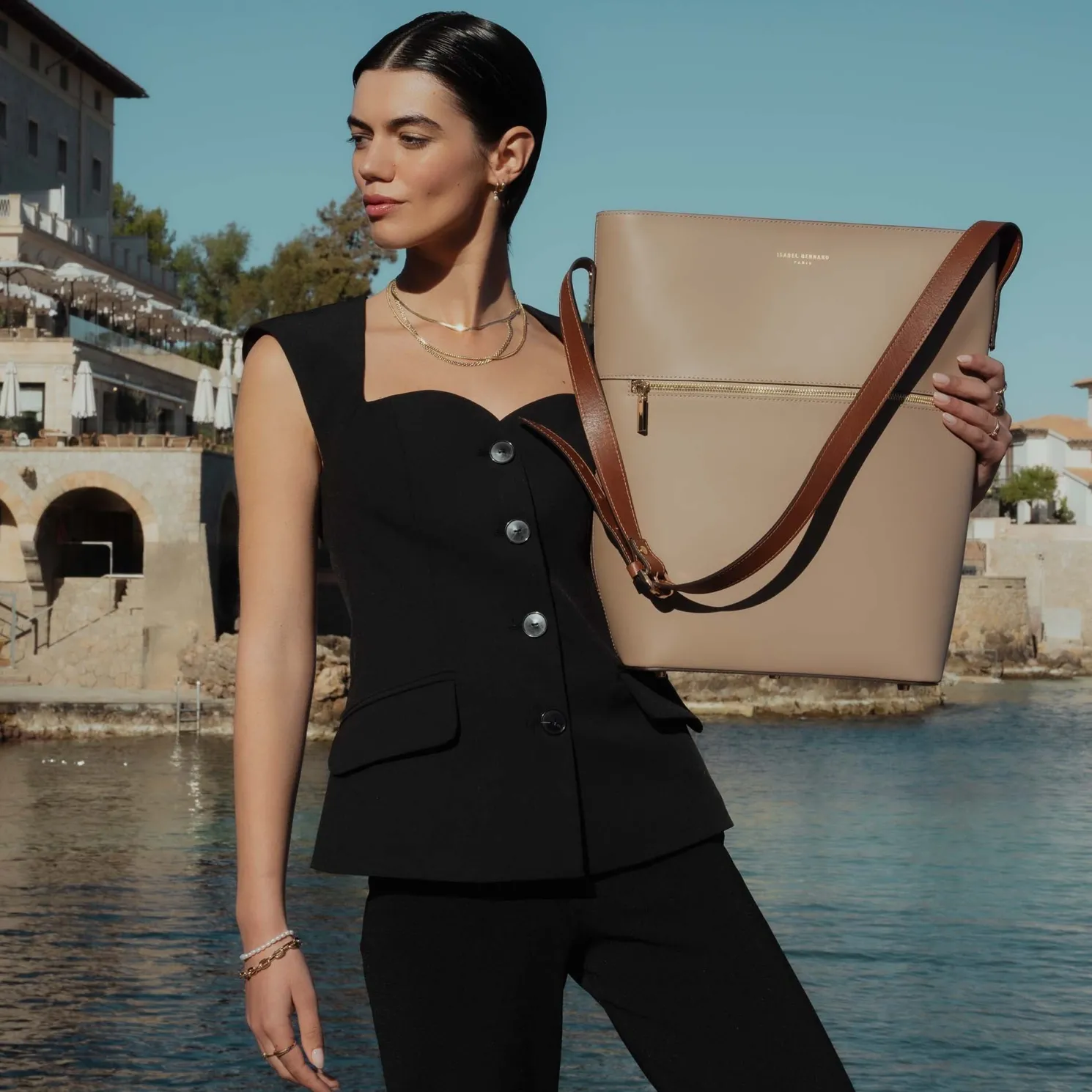 Honoré Flora taupe leren schoudertas van kalfsleer met laptopvak