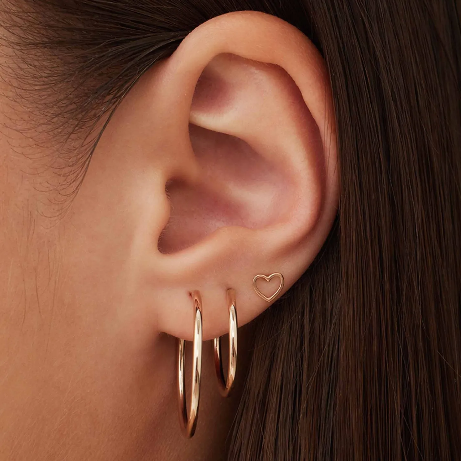 La Concorde Amore 14 karaat rosé gouden oorknoppen met hartje